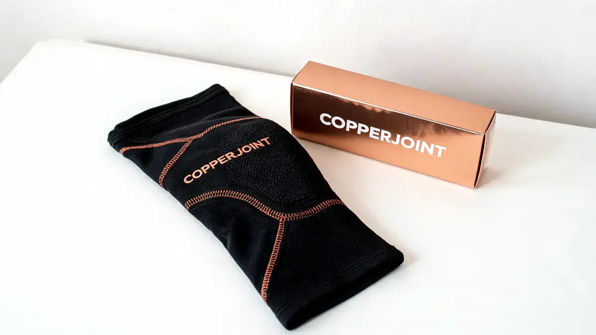 CopperJoint knee sleeve compression product on white surface